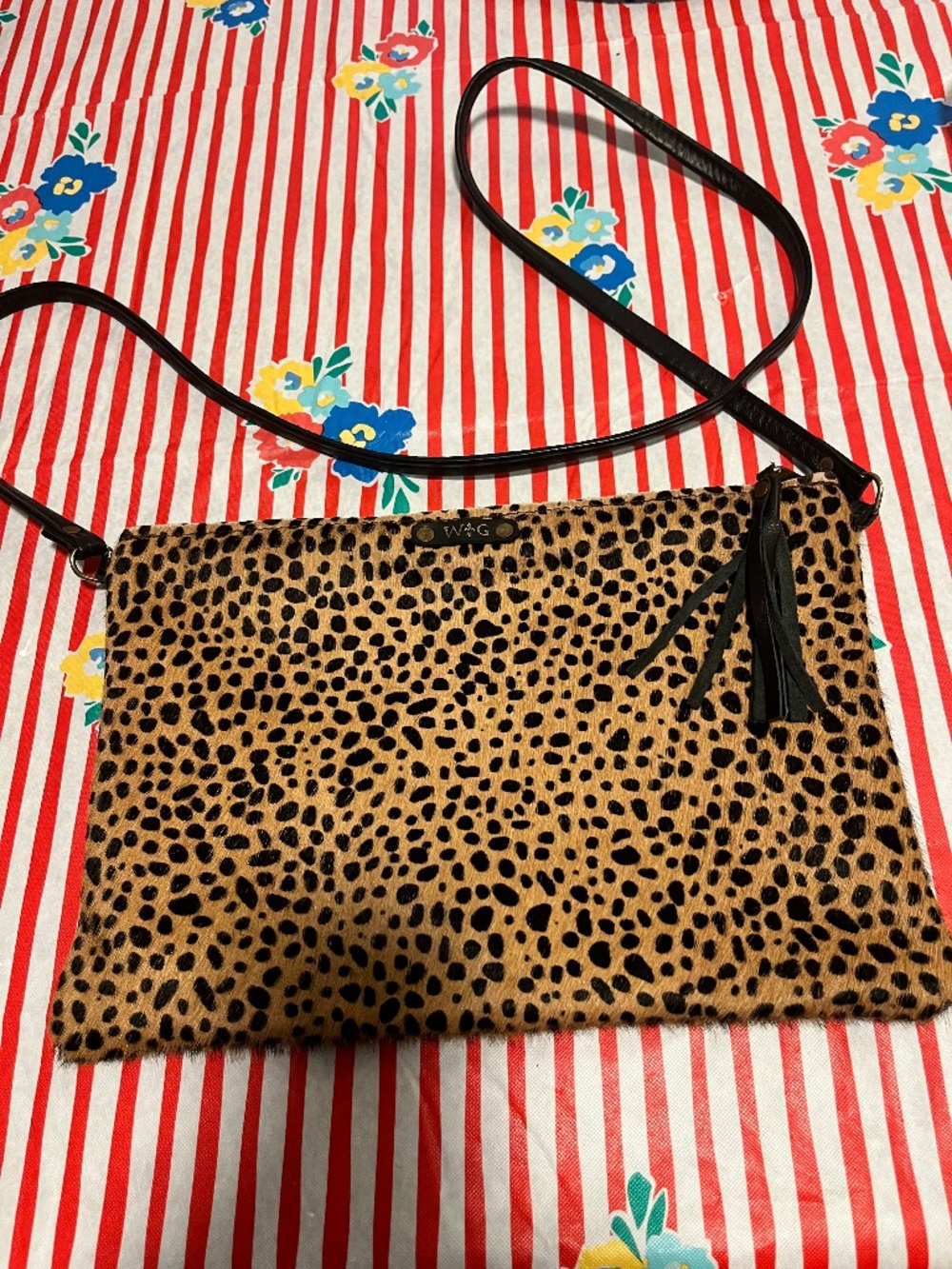 Wild Goose brand leather and calf hair cheetah print crossbody bag